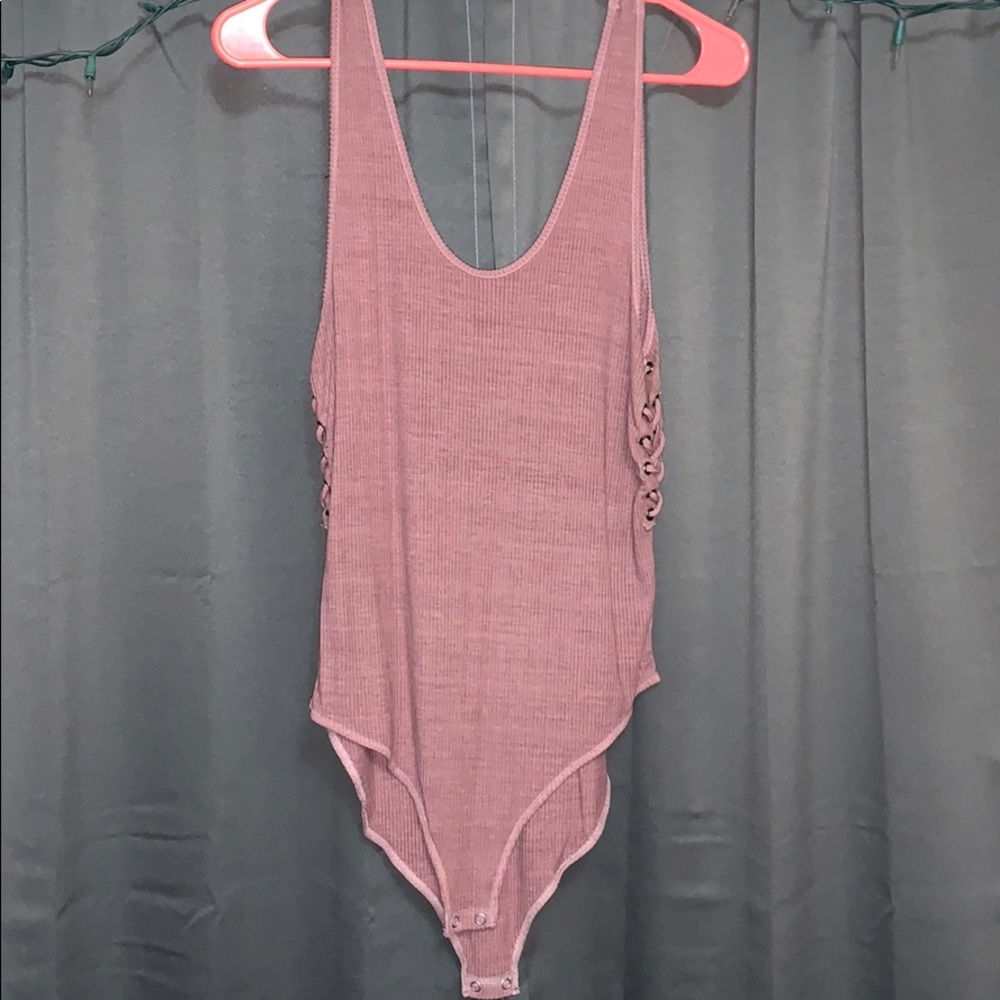 Mauve lace up side body suit